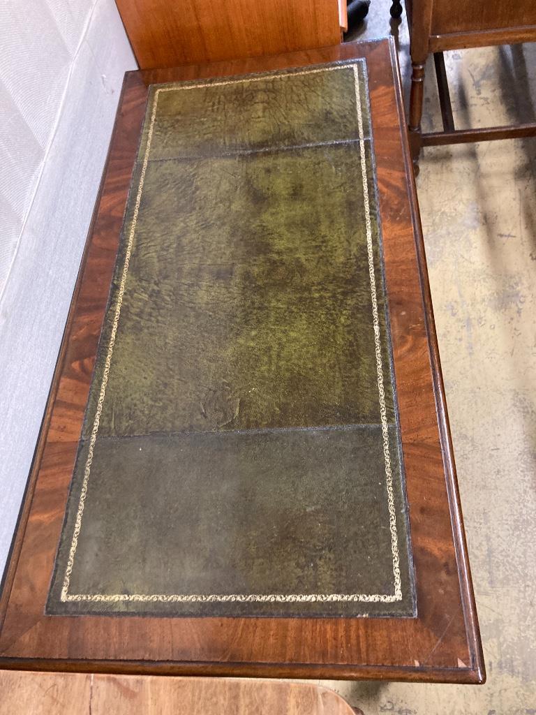 A Victorian mahogany two drawer writing table, length 114cm, depth 58cm, height 73cm